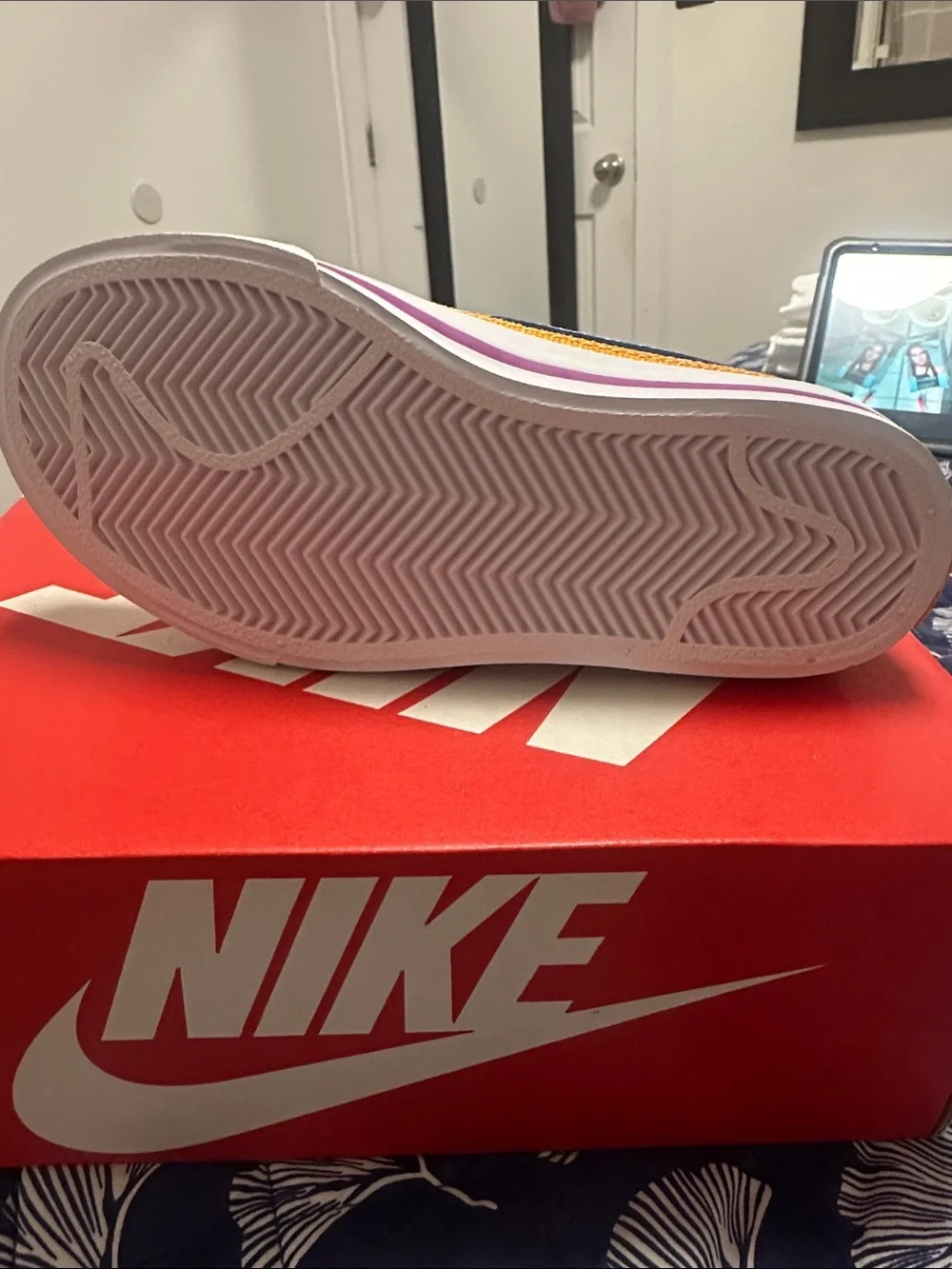 Nike Kids White Sneaker with Blue Swoosh and Purple Lining